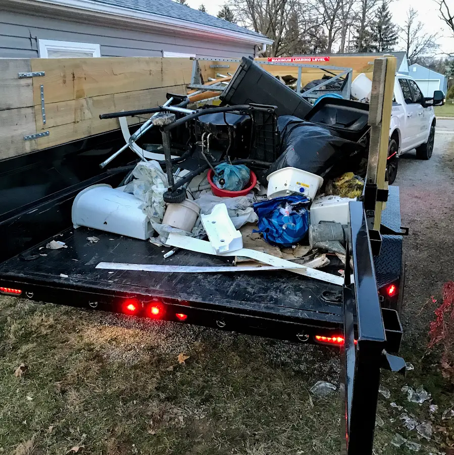 Roll-off dumpster delivered to a residential driveway in Olive